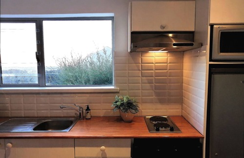 Capri Apartment | African Violet Guest Suites