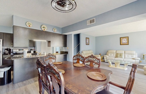 Little River House | All-suite Bay Tree retreat with al fresco dining, water views, and shared pool