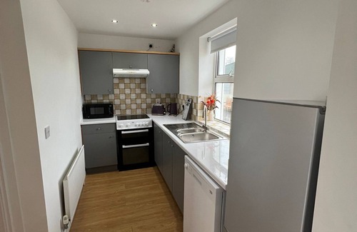 Dromore House | Alpaca Farmhouse with all weather private hot tub and alpaca experience included