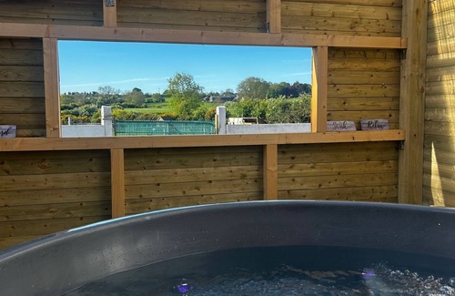 Dromore House | Alpaca Farmhouse with all weather private hot tub and alpaca experience included
