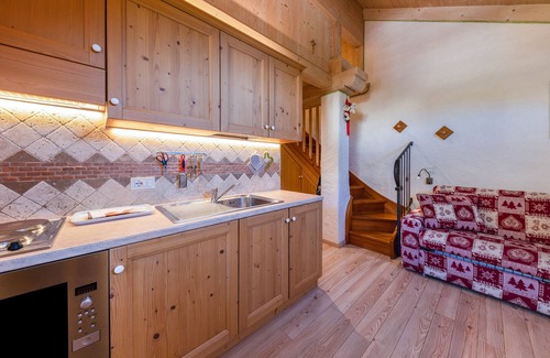 San Giovanni di Fassa Apartment | Alpine-style Apartment 'Catinaccio Rosengarten' with Wi-Fi