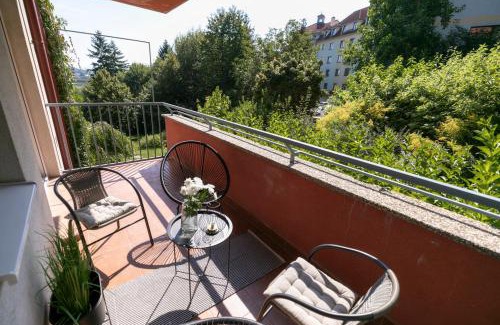 Banska Bystrica Apartment | ALURE RESIDENCES 2 & 24h self check-in, parking in the garage in the apartment building included, new building, terrace, green location with a forest park with a lake, children's playground