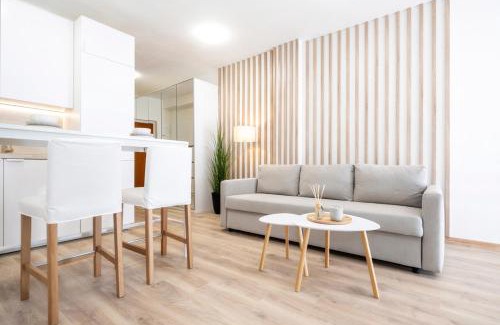 Banska Bystrica Apartment | ALURE RESIDENCES 2 & 24h self check-in, parking in the garage in the apartment building included, new building, terrace, green location with a forest park with a lake, children's playground