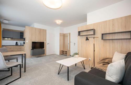 Banska Bystrica Apartment | ALURE RESIDENCES 12 & 24h self check-in & private parking next to the apartment building included, CITY CENTER right on SNP Square in a quiet passage, new building, best deal in town