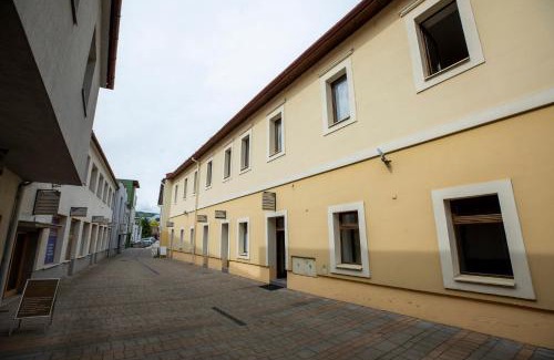 Banska Bystrica Apartment | ALURE RESIDENCES 12 & 24h self check-in & private parking next to the apartment building included, CITY CENTER right on SNP Square in a quiet passage, new building, best deal in town