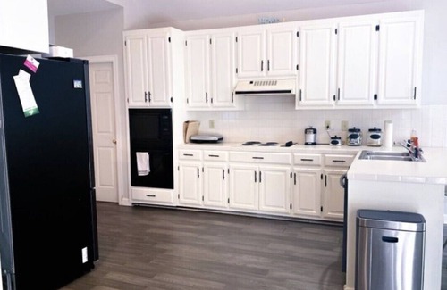 Tougaloo House | Amazing house living area washer and dryer with garage and backyard