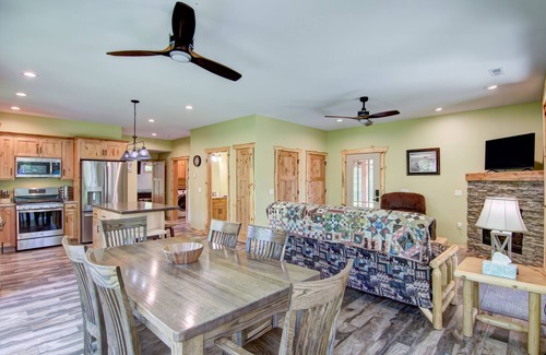 Tainter Lake House | Amazing River House with covered patio! Sleeps 10-14. Kayaks,Fireplace,Games.