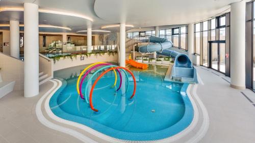 Kolobrzeg Apartment | Apartament B014 - Basen Bawialnia Fitnes Parking w CENIE Polanki Aqua - Holiday City