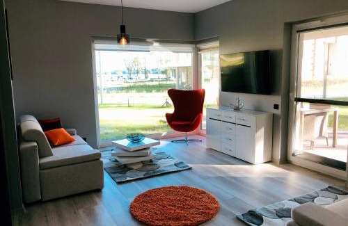 Wilkasy Apartment | APARTAMENT ELEGANCE ORANGE w Nautica Resort
