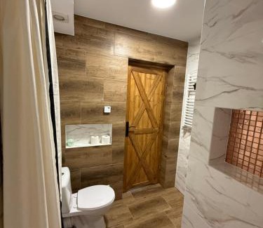 Szczytno Apartment | Apartament przy sadzie