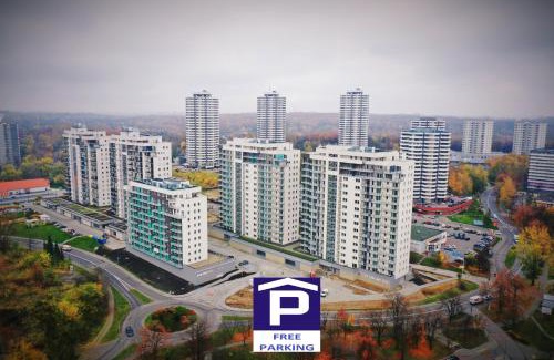 Katowice Apartment | APARTAMENT WŚRÓD 1000cy ŚWIATEŁ - z parkingiem w hali garażowej- duży balkon z leżakami - piekny widok nocą na panoramę Tysiaclecia