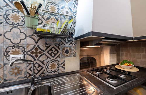 Uggiano la Chiesa House | Apartment 'Appartament Uccio' with Shared Terrace, Wi-Fi and Air Conditioning