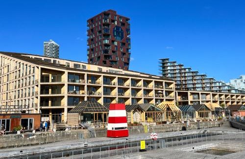 Aarhus C Apartment | Apartment directly to seafront of Bassin 7 with big balcony and free parking