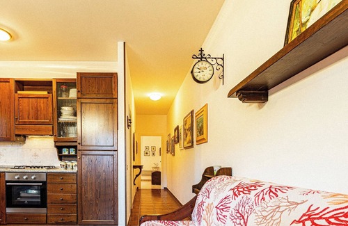 Porto Azzurro Apartment | Apartment 'Il Porto' Near the Beach with Balcony, Terrace & Garden