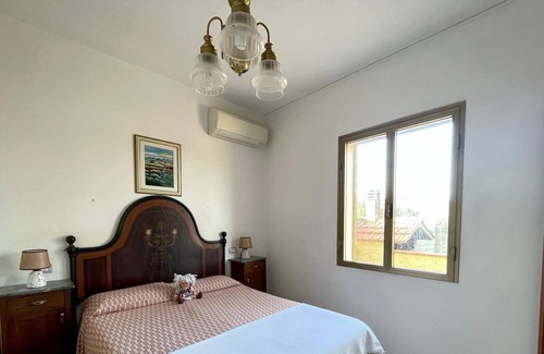 Sorso House | Apartment in villa with garden close to the sea