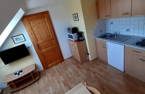 Gundersdorf Apartment | Apartment on a vineyard in a quiet, rural location, with a rustic balcony and a children’s playground on site