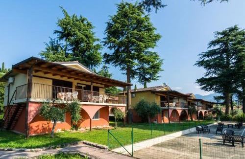 Villaggio Sanghen House | Apartment on Lake Garda with pebble beach pier for boat three swimming pools
