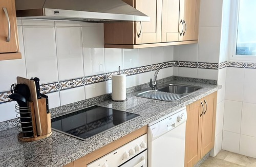 San Luis de Sabinillas Apartment | Apartment 'Residencial Duquesa' with Shared Pool, Wi-Fi and Air Conditioning