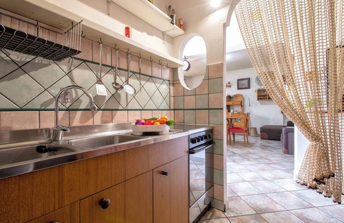 Lu Bagnu Apartment | Apartment 'Stone House Lu Bagnu' with Sea View, Wi-Fi and Air Conditioning