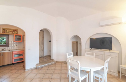 Porto San Paolo Apartment | Apartment 'Tavolara Porto San Paolo E2' with Sea View, Shared Pool and Air Conditioning