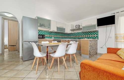 Budoni Apartment | Apartment 'Villetta Vacanze Budoni' with Private Terrace, Private Garden and Air Conditioning