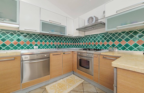 Budoni Apartment | Apartment 'Villetta Vacanze Budoni' with Private Terrace, Private Garden and Air Conditioning