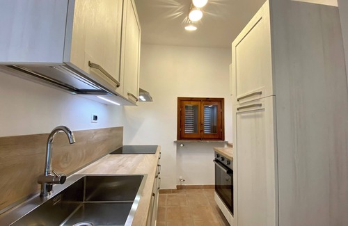 Guardistallo Apartment | Appartamento di Charme con Vista Panoramica Sulla Campagna Toscana Fino al Mare