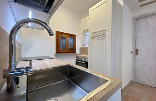 Guardistallo Apartment | Appartamento di Charme con Vista Panoramica Sulla Campagna Toscana Fino al Mare