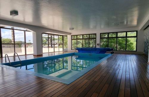 Floresta Apartment | Apto no centro de Gramado com piscina aquecida