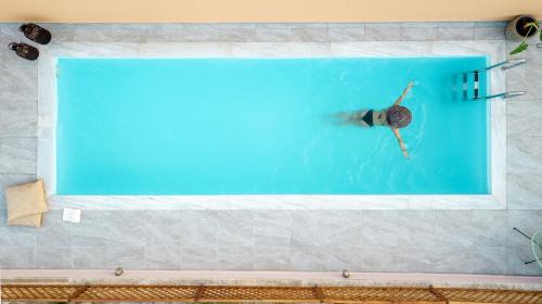 Spilia House | Arch Houses - sharing pool
