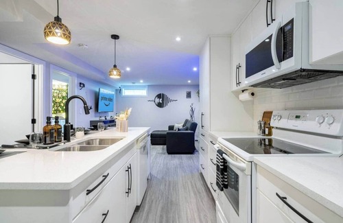 Northeast Edmonton Apartment | Art, comfort, and fun just 15 minutes to downtown and steps from shops