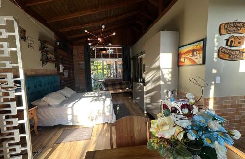 Nacoes House | Arthi - LINDO LOFT RECANTO DOS PASSARINHOS com HIDROMASSAGEM!