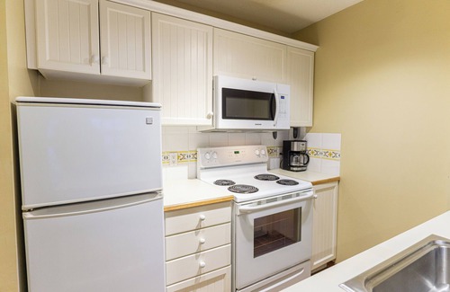 Upper Village Condo | Aspens #303 Prime Ski-in Ski-out Location! Pool, Hot tubs, sleeps 4