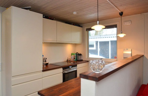 Idestrup House | At the end of a small side street and only about 150 m from the beach lies this cozy vacation home.