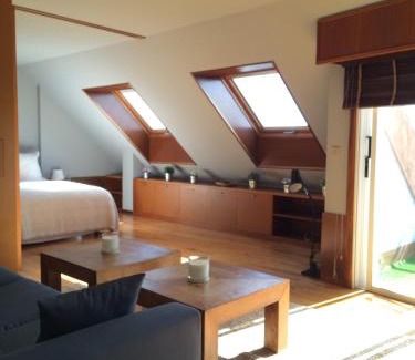 Souto Apartment | Attic loft to wake up by the sea.