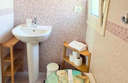 Focene Apartment | Azure Oasis with parking near the airport & beach