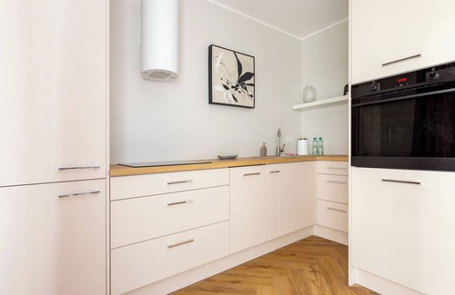 Siedlce Apartment | Baltic White Pearl Studio with Garden