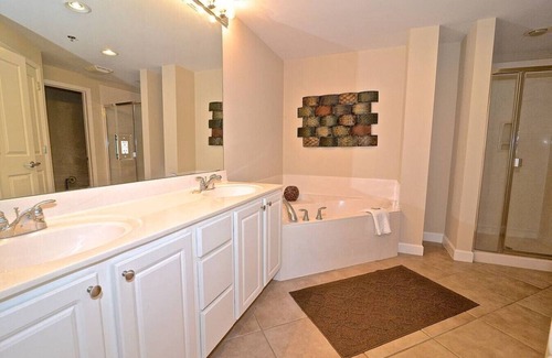 Gulf Shores Condo | Bay front- Bay John-boat slips-pier