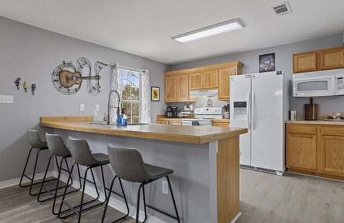 Shoreline Park House | Bay St. Louis Pool, Hot Tub, Ping Pong, Fire Pit, and Grill Waterfront Home