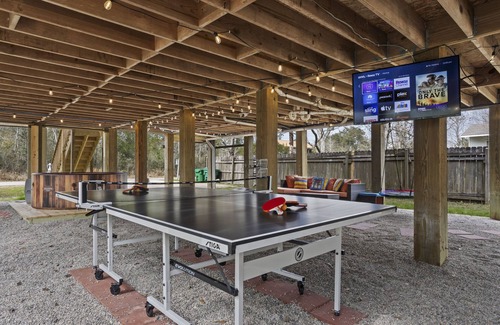 Shoreline Park House | Bay St. Louis Pool, Hot Tub, Ping Pong, Fire Pit, and Grill Waterfront Home