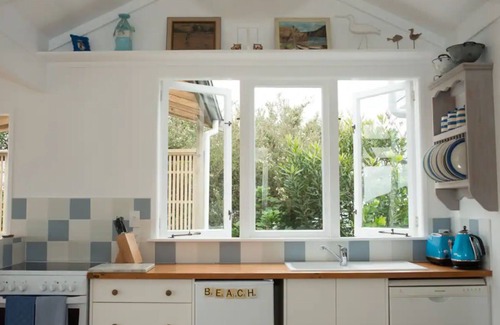 Raglan Cottage | Bay View Beach House - gorgeous seaside cottage with panoramic views over Raglan