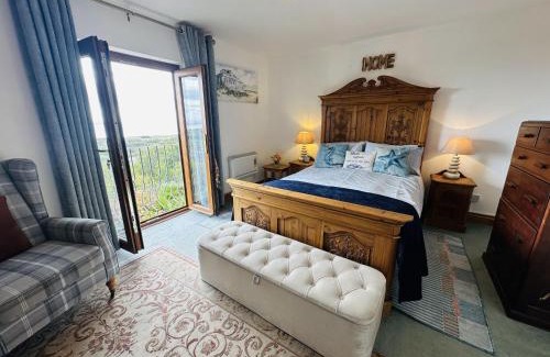 Pendine House | Bay View - holiday cottage by the sea with stunning views