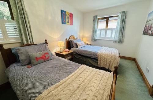 Pendine House | Bay View - holiday cottage by the sea with stunning views