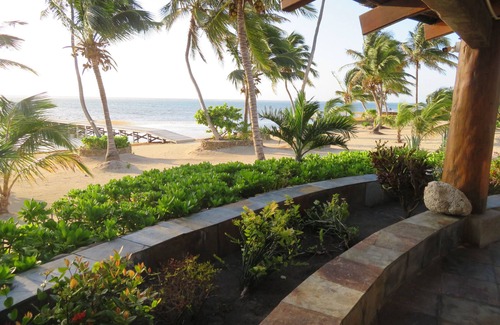 San Pedro Villa | Be right on the beach with a designer pool and your own tennis/pickleball court!