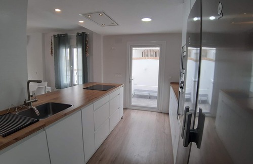 Rota House | Beach and pine trees.