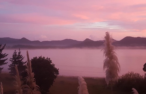 Kennedy Bay House | Beach, Bush, Birdsong and stunningly Beautiful views...with a touch of luxury.