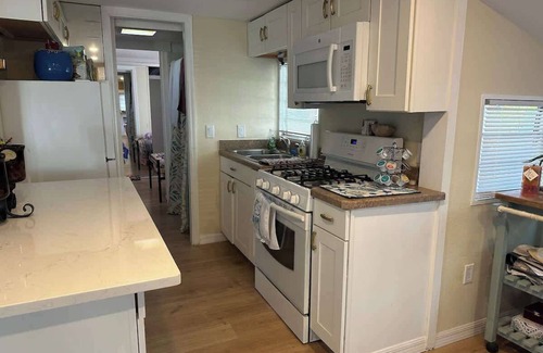 Ozona House | Beach Stay w/pool, bicycle, walkable community