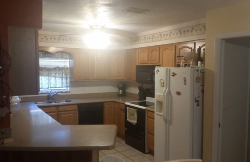 Pelican House | Beach themed tropical Pool Home, family fun and pet friendly.