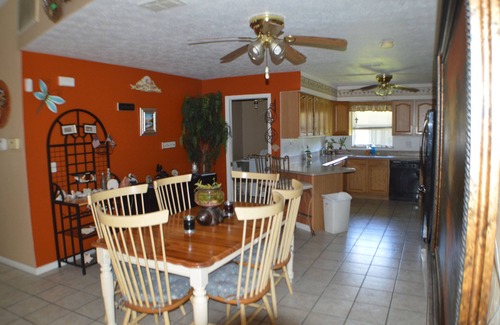 Pelican House | Beach themed tropical Pool Home, family fun and pet friendly.