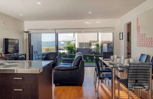 Whitianga Apartment | Beach views from apartment at Aqua Soleil complex with lap pool & spa.